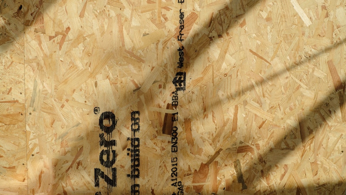 Oriented strand board surface with diagonal shadows